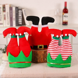 Trois chapeaux de Noël créatifs jambes d'elfe et Père Noël avec sequins et grelots