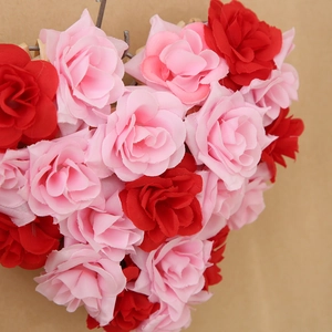 Red and pink artificial rose heart wreath for Valentine's Day wall decoration