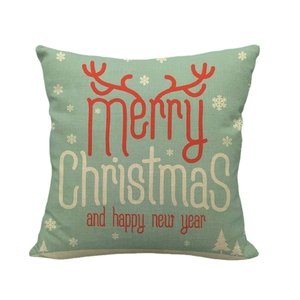Linen Christmas pillow case with red antlers and merry Christmas text on green background