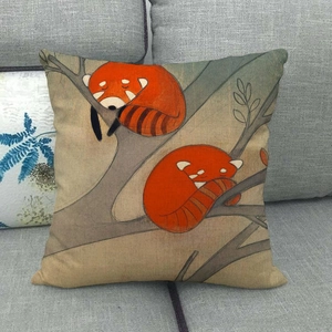 Detail of linen pillowcase featuring cute sleeping pandas on a branch for sofa decor