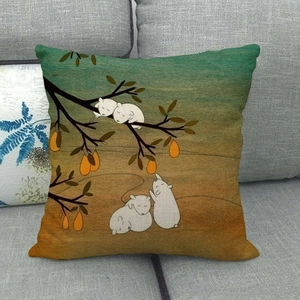Detailed texture of linen cushion cover featuring cartoon autumn leaves and rabbit prints