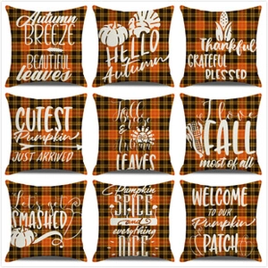 Detail of nine autumn plaid pillowcases with white pumpkin and maple leaf prints