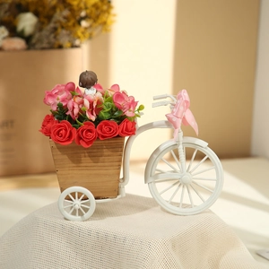 Mini tricycle flower basket with red roses and cute figurine for desktop decoration