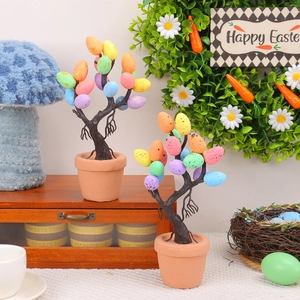 Easter egg potted tree with colorful speckled eggs and artistic black branches for decor