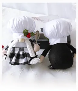 Detailed macro view of plush chef gnomes showing woven braids and fabric textures