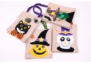 Halloween burlap gift bags set with pumpkin witch and skull designs for party favors