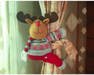 Detailed view of a plush reindeer curtain tieback with red striped sweater for Christmas decor