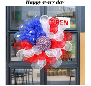 Detail of USA Independence Day mesh wreath featuring stars and red white blue spirals
