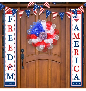 Detailed view of patriotic 4th of July wreath and vertical door banners on a wooden door