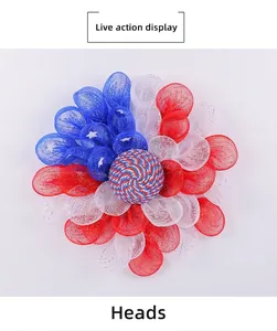 Close-up of patriotic American Independence Day wreath with red white and blue mesh texture