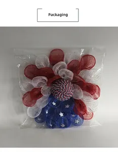 Detail of USA Independence Day mesh wreath in red, white, and blue with star accents