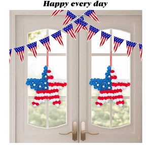 Independence Day decor featuring red blue white star wreaths and American flag bunting