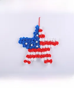 Detail of star-shaped Independence Day wreath with red, white and blue faux roses