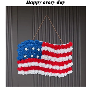 Macro detail of patriotic American flag door hanger made of red white and blue foam roses