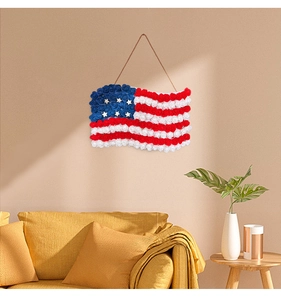 Detailed close-up of a wavy American flag wall hanging made of faux roses for home decor