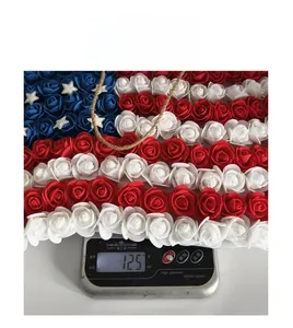 Weight measurement of 125g for the patriotic USA flag floral wreath decoration with twine