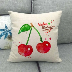 Linen fruit throw pillow with watercolor cherry print on a dark gray sofa