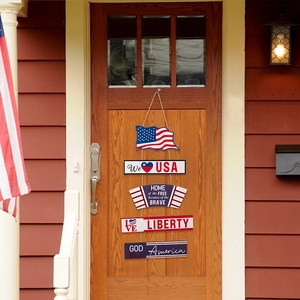Vertical five-tier wooden USA door sign with patriotic prints hanging on a dark wood door