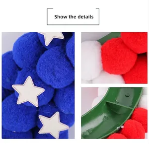 Detail van de 4 juli hoofdband met kleurrijke pompons en witte sterpatches erop