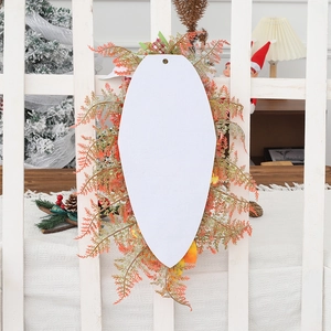 Autumn harvest door wreath with orange fern leaves and white blank wooden plaque
