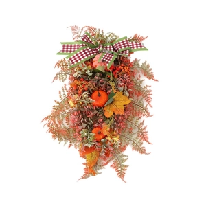 Autumn harvest door wreath with orange pumpkins, red berries and a plaid bow decoration