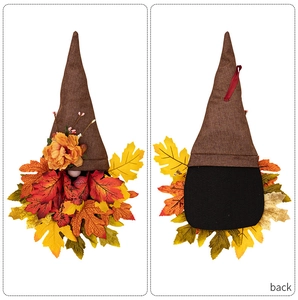 Front and back detail of autumn gnome decoration with maple leaves and burlap texture