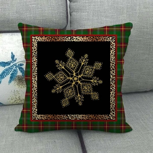 Detailed close-up of Christmas snowflake linen pillow cover with red and green plaid borders
