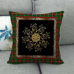 Detail of linen pillowcase with Scottish plaid, leopard print, and gold mandala pattern