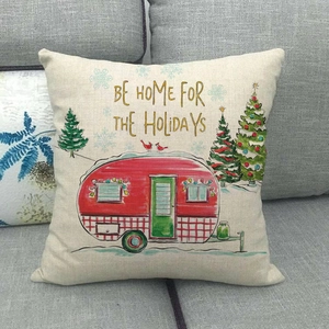 Funda de cojín navideño de lino con caravana roja vintage y mensaje de felices fiestas