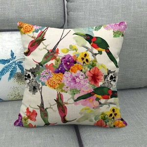 Linen sofa cushion cover featuring vibrant tropical bird and flower floral patterns