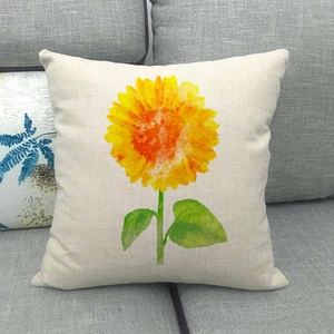 Detail of linen sofa pillowcase featuring a vibrant sunflower print on textured fabric