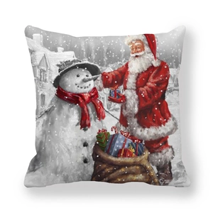 Detailed close-up of Santa and snowman festive print on peach skin fabric pillowcase