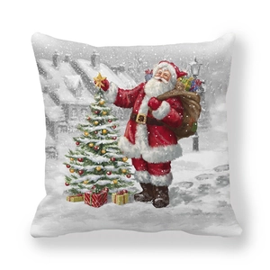 Detail of Christmas pillowcase featuring Santa Claus, a festive tree and gifts scene
