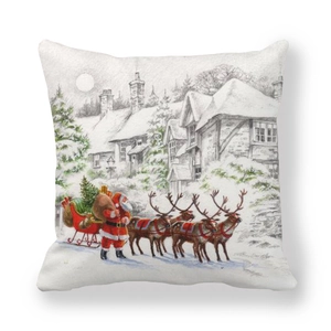 Detail of Christmas pillow cover with Santa Claus, reindeer, and snowy village print
