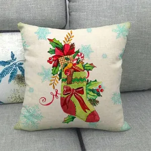 Detailed view of linen Christmas pillowcase featuring festive stockings and snowflake patterns