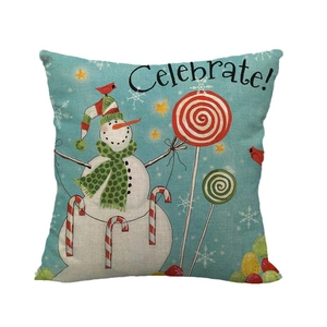 Christmas snowman cushion cover with blue background and festive candy cane patterns