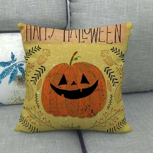 Detail of Halloween pumpkin pattern and textured fabric on the orange throw pillow cover