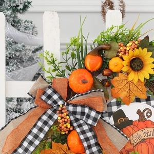 Autumn harvest wreath with sunflowers, pumpkins, and buffalo plaid bow for fall decor