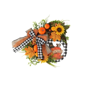 Thanksgiving wreath with sunflower, pumpkin, maple leaves and Give Thanks sign on white background