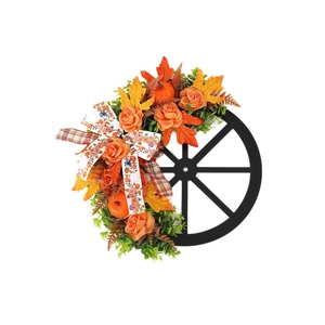 Fall wreath with orange roses, pumpkins, and buffalo plaid bow on black wagon wheel frame