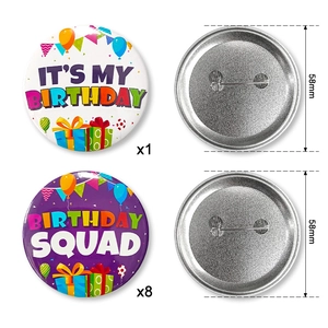 Detail of 58mm birthday tinplate button pins showing front designs and back safety pins