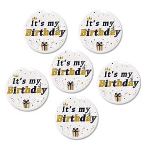 Set of six white 58mm birthday badges with gold and black 'It's my Birthday' lettering