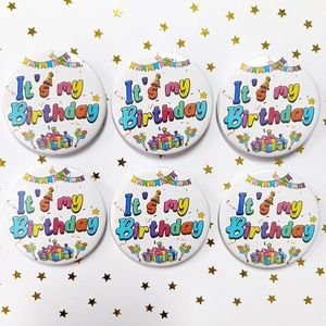 Set of 6 white tinplate birthday badges with colorful festive patterns and text