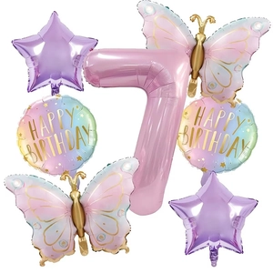 Detail of butterfly and star foil balloon set for 7th birthday party decorations
