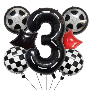 Racing car 3rd birthday balloon set with black number 3, tire shapes, and checkered foil flags