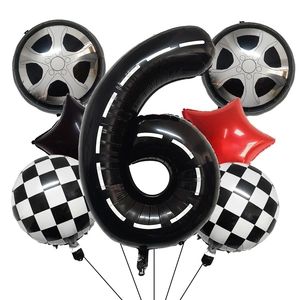 Racing theme party set with black number 6 balloon, checkered flags and tire foil balloons