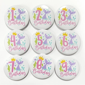Detailed set of nine mermaid-themed tinplate birthday badges with numbers 1 to 9