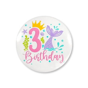 Detail of mermaid 3rd birthday tinplate badge with crown and pink number decoration