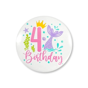 Detail of mermaid birthday badge featuring a pink number four and sea elements