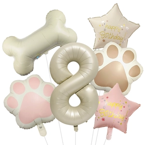 Dog bone balloon party set featuring cream number 8 and paw print star balloons